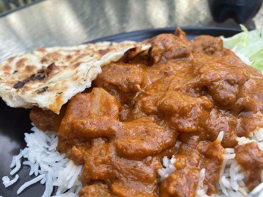 Lamb vindaloo and garlic naan
