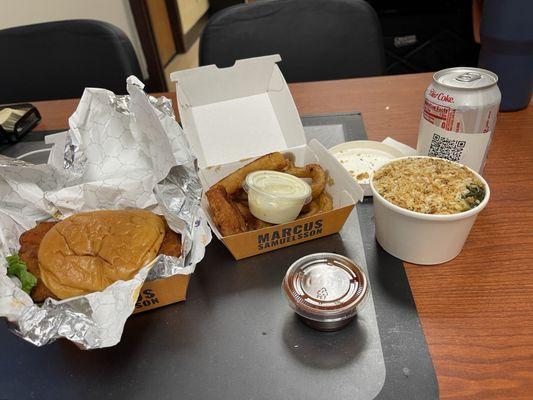 Spicy chicken sandwich, mac and greens, onion rings