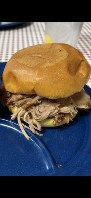 A giant, wonderful, delicious pulled pork barbecue sandwich.