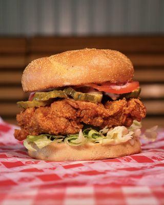 Indulge in the epitome of comfort food with our exceptional THE Fried Chicken Sandwich.