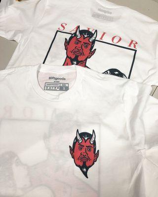 Direct to garment full color printint on light tees with custom inside tags.