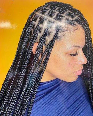 Ameda Boutique & Braider Shop