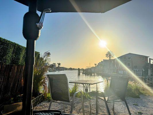 Look at that view! A man came out and offered to open the umbrella for us too