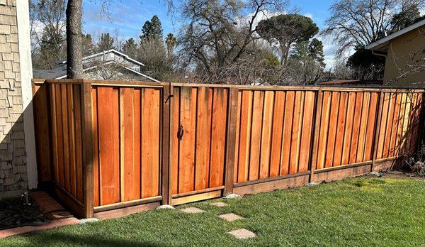 Board on board wood fence installation