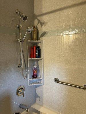 New shower, hand rail, and corner shelves.