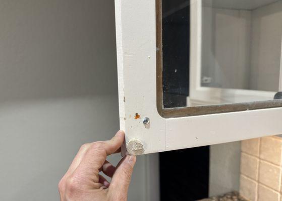 Didn't clean glass on cabinets nor inside with a wet rag