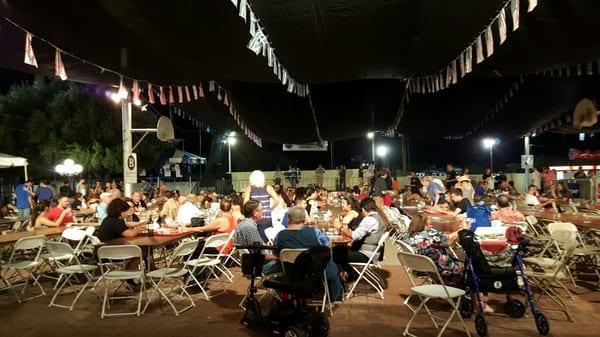 Yummy food, music under the beautiful evening sky.