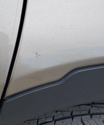 One of the dents / paint scratches caused by the damaged sprayer that hit our vehicle