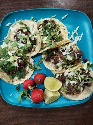 clockwise from nine o'clock - Asada, Adobada, Barbacoa and 2 lengua. Loaded with meat, they are a steal at 5 for $8