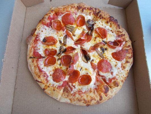 This is the pizza with mushrooms, pepperoni, and cheese, as well as the crust I described in the review.