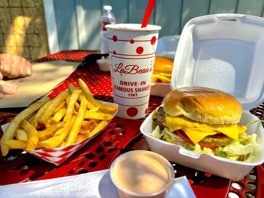 Double cheeseburger, fries, fry sauce and their "famous raspberry shake"