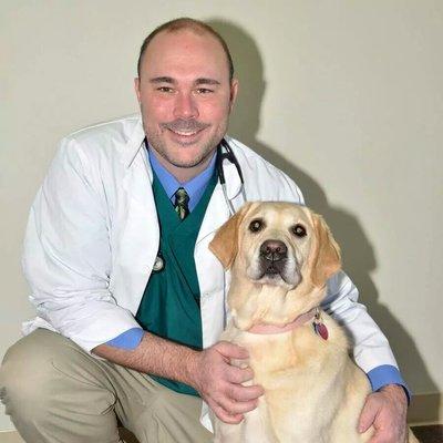 Dr. Cryan with his seeing eye dog dropout Bliss.