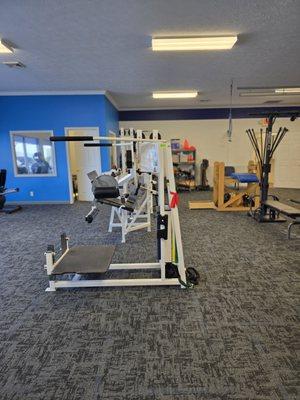 Professional, well-equipped treatment area at Adams Physical Therapy, supporting clients as they work toward healthier, stronger movement!