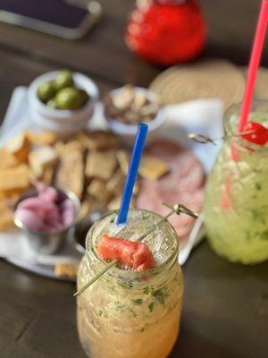 Watermelon mint drink, pineapple mojito, salami tray.