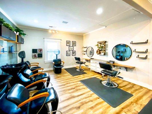 Stylist chairs and shampoo stations