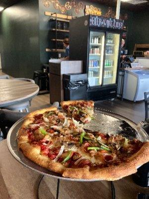 The "Pantry" Pizza. Italian sausage, cup & char pepperoni, green peppers, onions, fresh mushrooms, mozzarella, red sauce base
