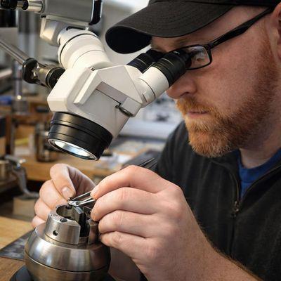 Richard Setting gemstones.