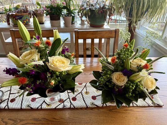 Green hypericum berries, roses, magnolia leaves, and Veronica