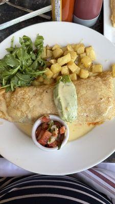 Chorizo & Avocado crepe with Arugula & crispy cut potatoes.