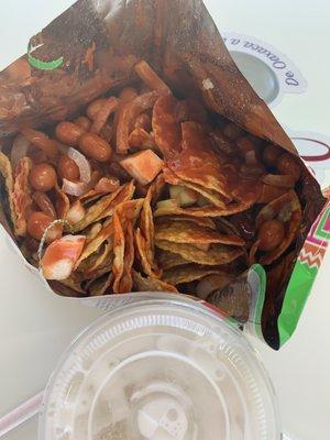 This is call Tostiloco,it is made in a Tostito bag with Tostitos, Jamaica, cucumber, sweet coded peanuts,