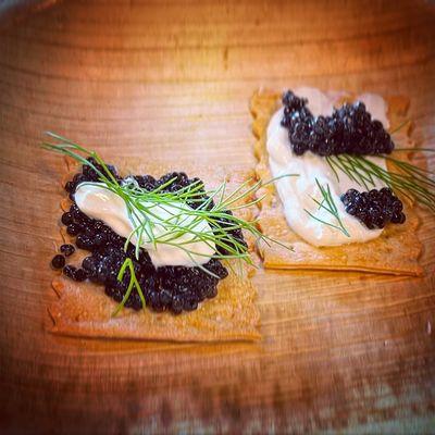 Calvisius Caviar, baby dill, Clover sour cream and Rustic Bakery's rosemary and olive oil crackers. Simple and delicious.