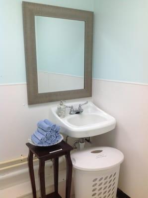 Eco friendly bathroom using towels that can be reused instead of disposable paper towels