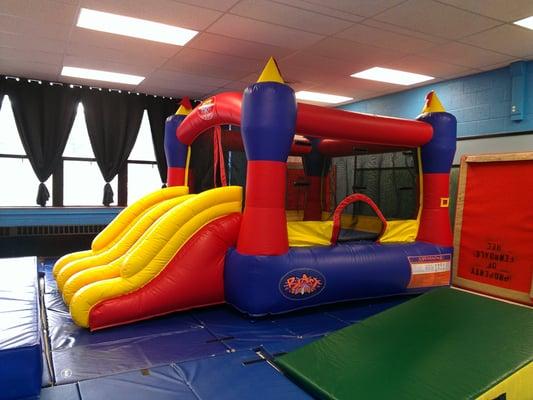 The bounce house in the toddler play room