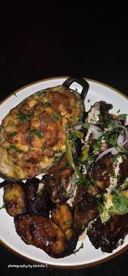 Wingz & Tingz Grilled jerk teriyaki wingz and mac n cheese & plantains with white sauce.