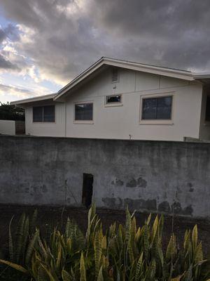 Completion of exterior house paint job final coat and trim