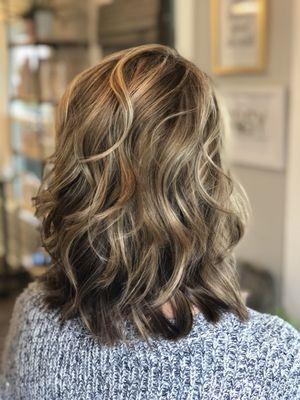 Soft blended grey coverage and blonde highlights