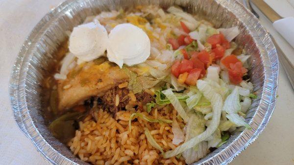Stuffed sopapilla with shredded beef & green chile. I added sour cream at home.