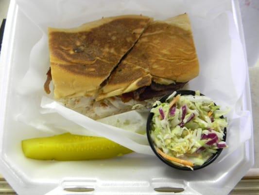 Pressed sandwiches made with fresh roasted pork, beef and turkey, homemade salads,