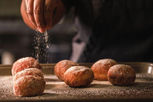 Kiawe Cinnamon Sugar Dusted Kūlolo Malasadas