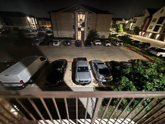 Cars with covered license plates in a parking lot