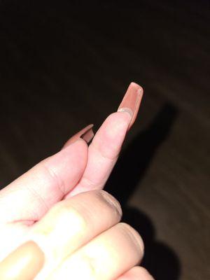 Black gel polish still there along the side of the nail