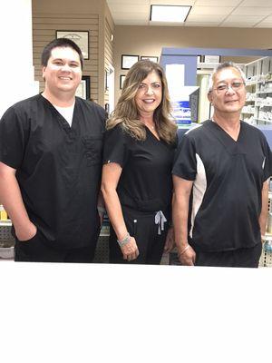 The pharmacist at Parker Road Speciality Pharmacy. Tyler Soo, Laura Daughdrill, Mike Soo owner.
