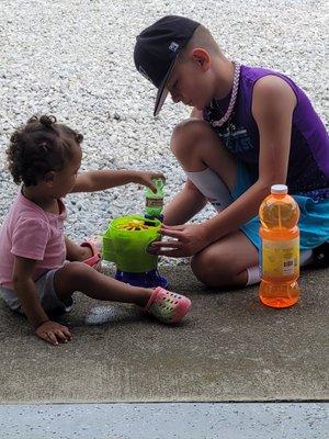 Warm summer day and tropical sno between cousins