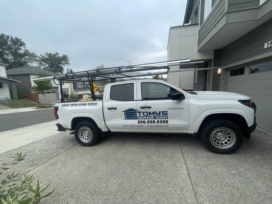TOMY'S Garage Door service truck fully equipped for same day garage door repair, installation, and replacements all across