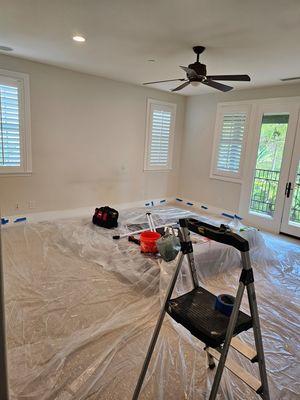 Before new drapes paint wood paneling and lights