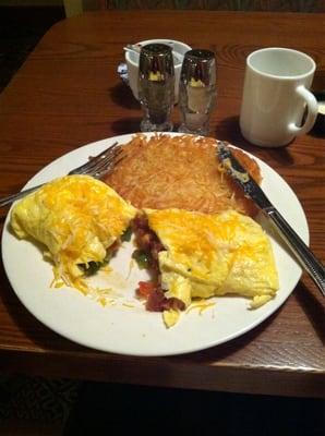 3 egg omelet w/ cheddar, ham, peppers and tomatoes w/ hash browns ($7.25)