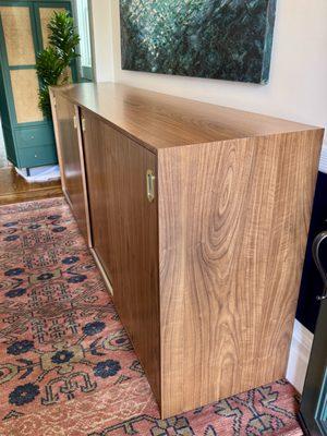 Custom walnut entryway cabinet