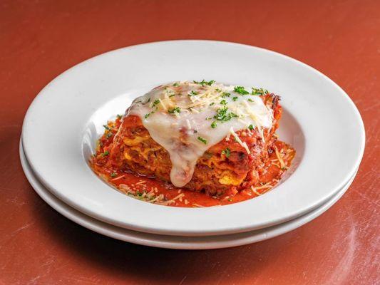 Lasagna-Layers of Italian lasagna noodles, ground beef, Italian sausage, mozzarella and cream cheese with Italian spices. Topped with marina