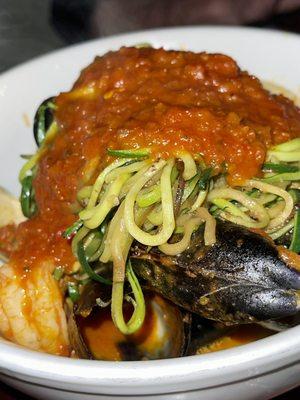 Zucchini linguine with red sauce, clams and mussels.