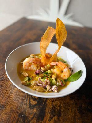 Mango Ceviche $12.95
Seafood mix, cucumber, red onions, marinated in mango leche de Tigre served with
sweet potato