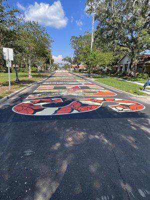 You have to see it in person. Every letter was painted by a different artist.