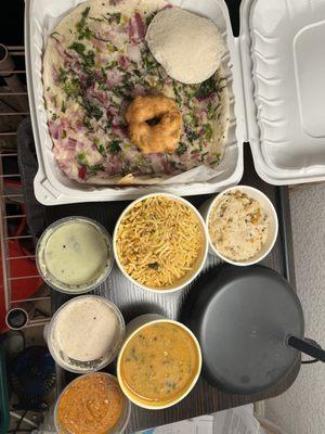 Idli,vada, upma, veg biryani & onion utappam with coconut, peanut & tamato chutneys