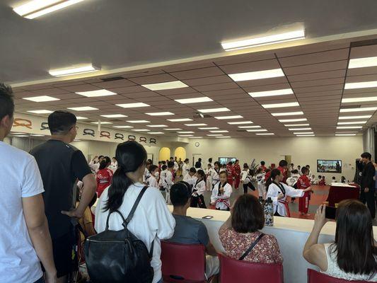 Sardine belt testing and this is not even all the kids one group sitting and waiting in the back