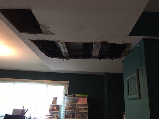 Damaged drywall in ceiling.