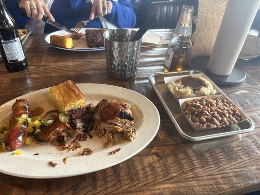 Jalapeño pepper, prime brisket, pulled pork mashed potatoes, baked beans and cornbread