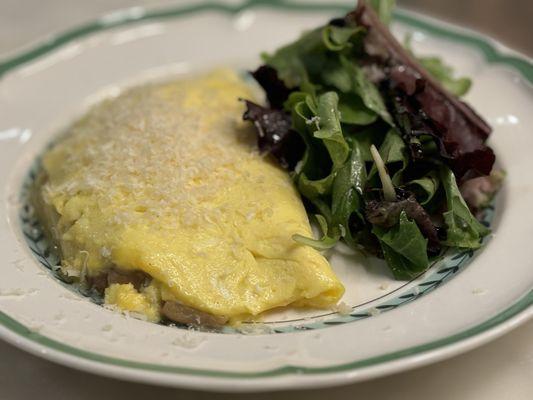 Omelette ($21): Organic eggs, porcini, and parmigiano reggiano (aged 24 months), served with a simple salad.